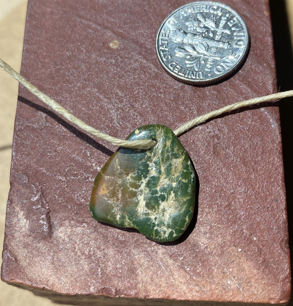 10 carat dark green turquoise tab style bead from Stone Mountain Mine