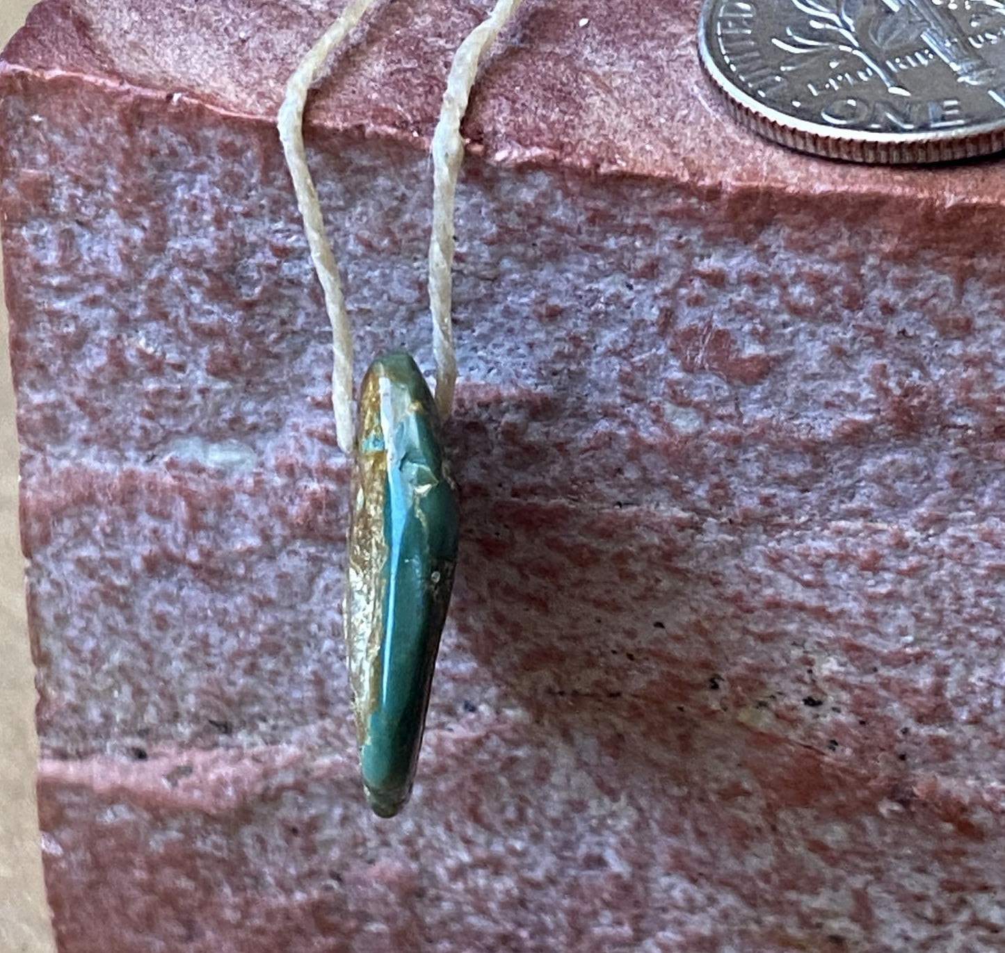 7 carat blue teal Stone Mountain Turquoise tab style bead with inclusions