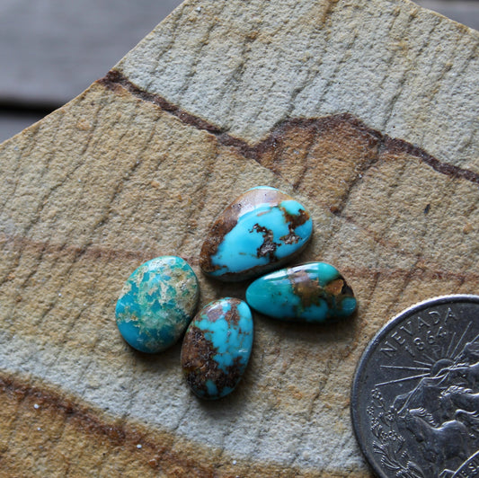 Small blue Stone Mountain Turquoise cabochons with red matrix