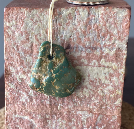 13.6 carat dark green turquoise focal bead from Stone Mountain Mine