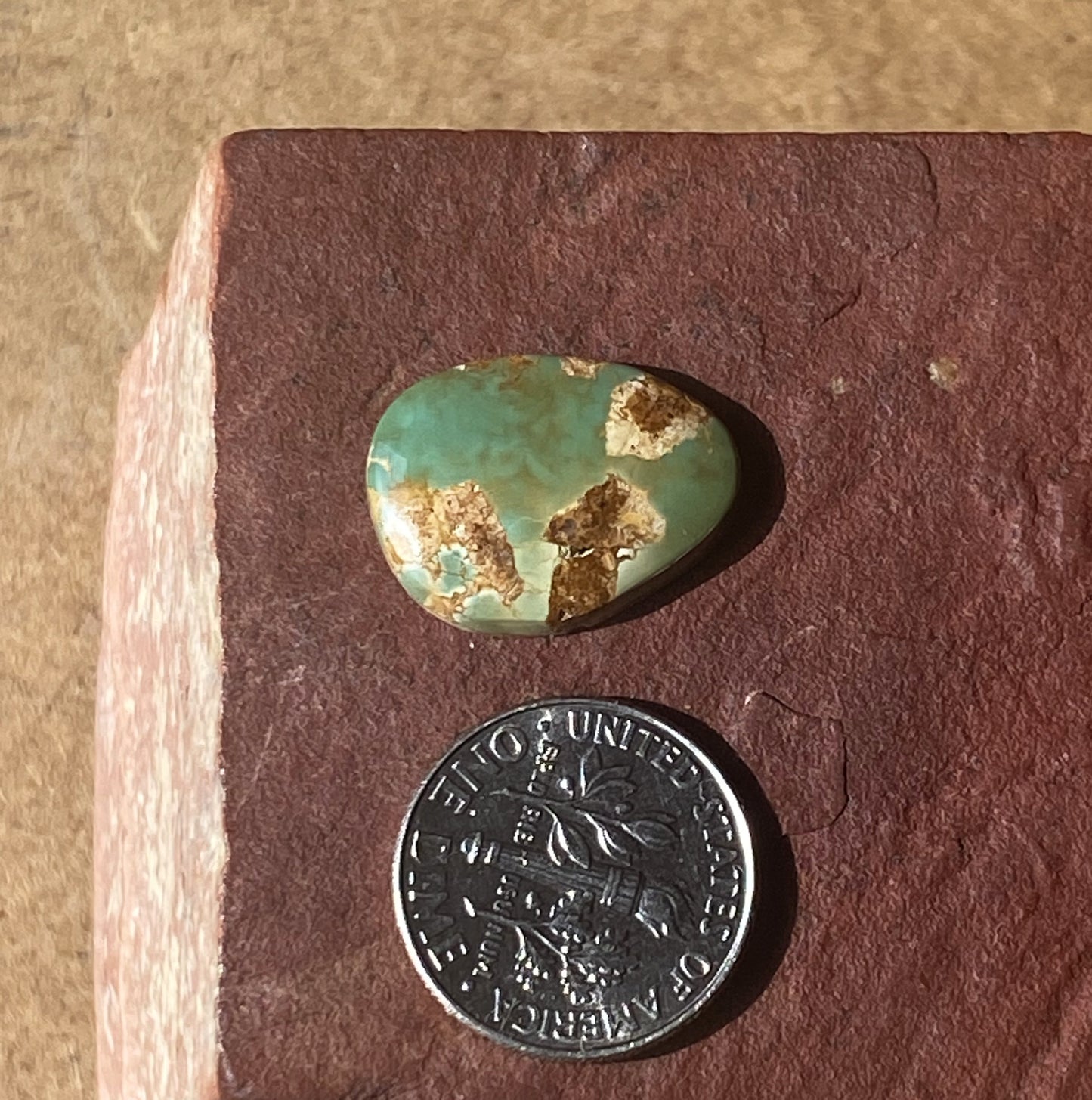 7 carat green Stone Mountain Turquoise cabochon with red matrix