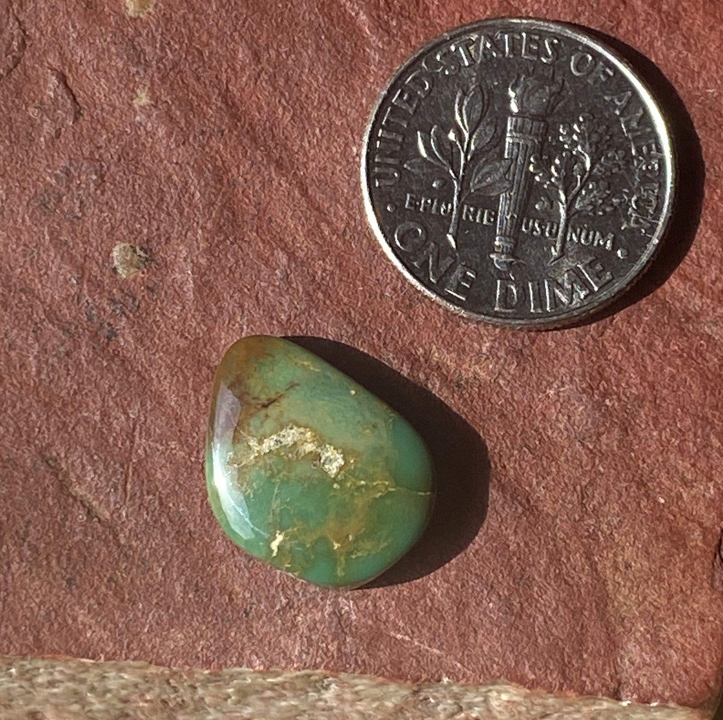 6 carat dark green Stone Mountain Turquoise cabochon