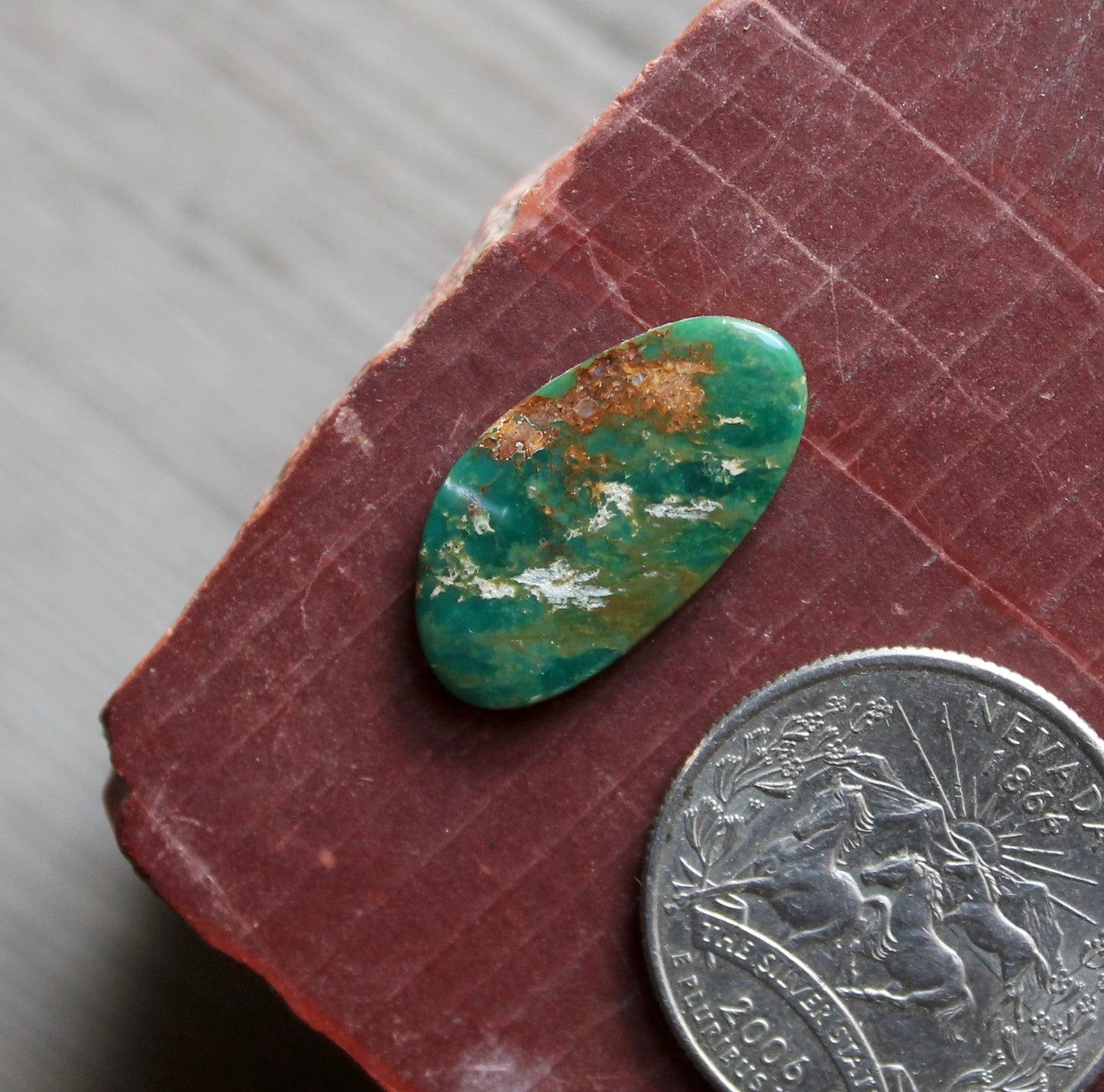 7 carat green Stone Mountain Turquoise cabochon with red matrix