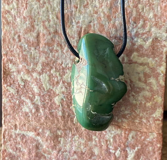 28.5 carat dark green turquoise focal bead from Stone Mountain Mine