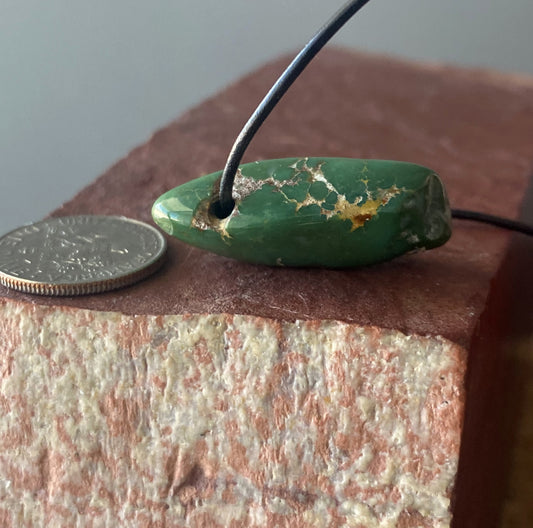 28.5 carat dark green turquoise focal bead from Stone Mountain Mine
