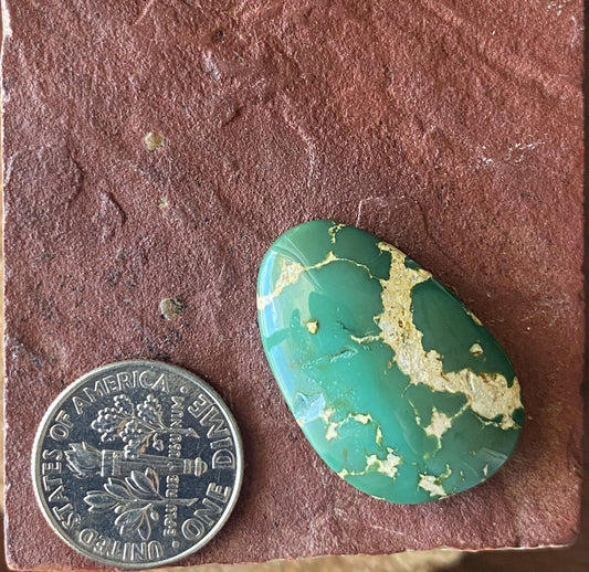 22 carat green Stone Mountain Turquoise cabochon with a high dome