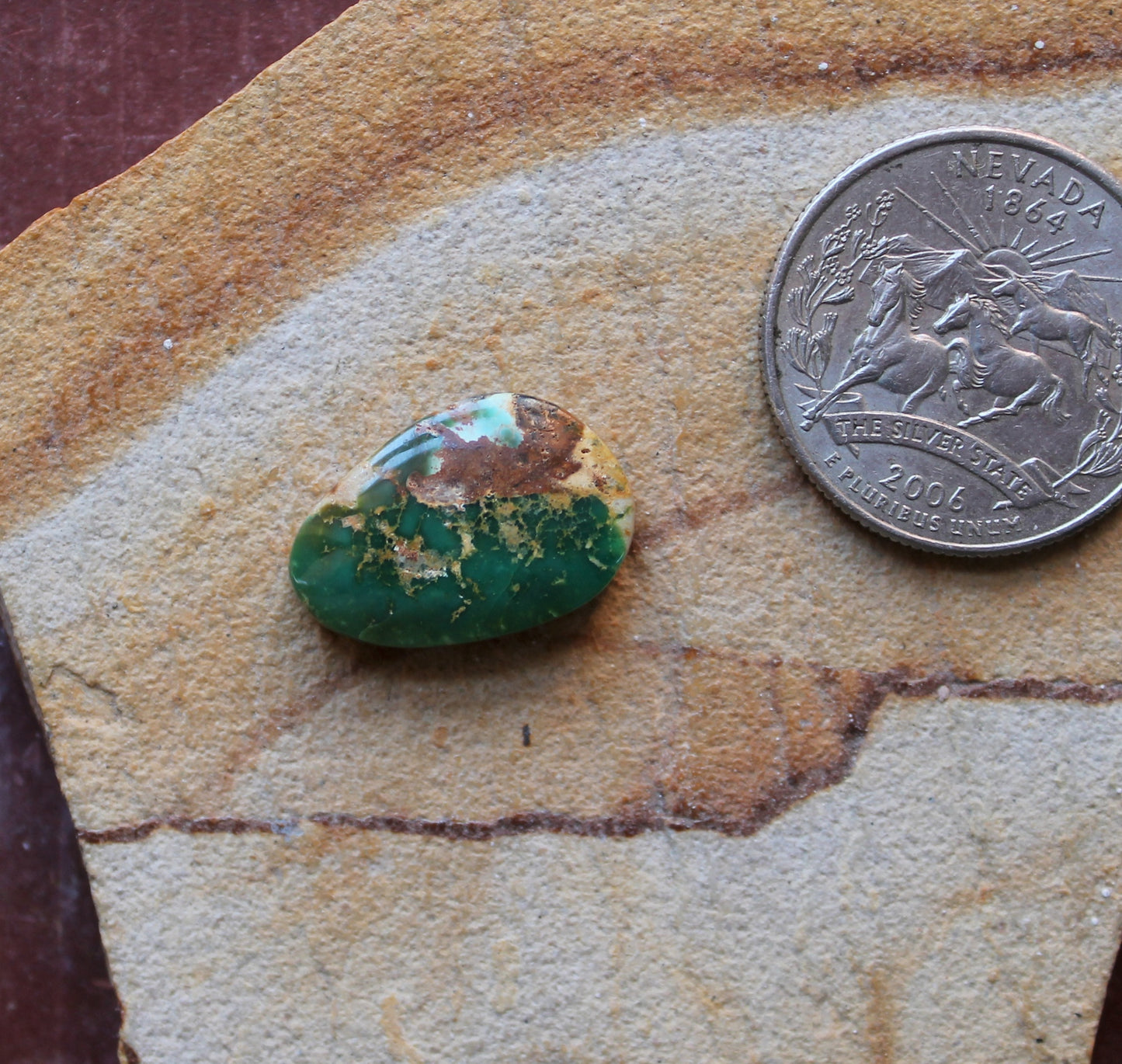 10 carat green Stone Mountain Turquoise cabochon with red matrix