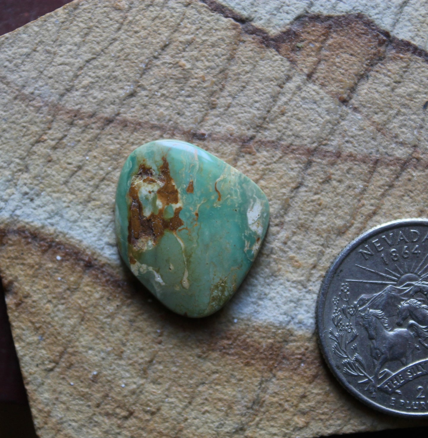 10 carat green Stone Mountain Turquoise cabochon with red matrix