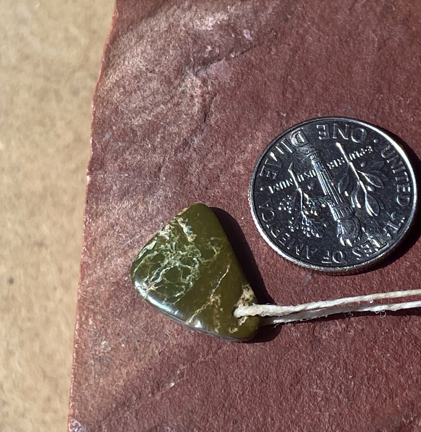 3 carat dark green Stone Mountain Turquoise tab style bead