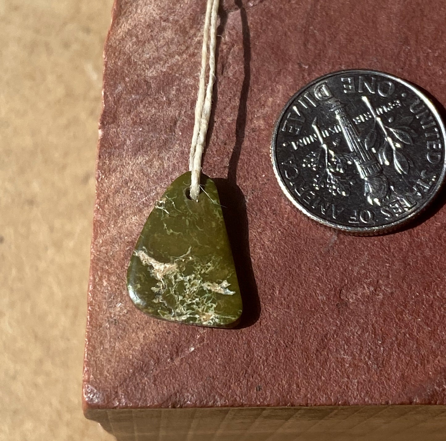3 carat dark green Stone Mountain Turquoise tab style bead