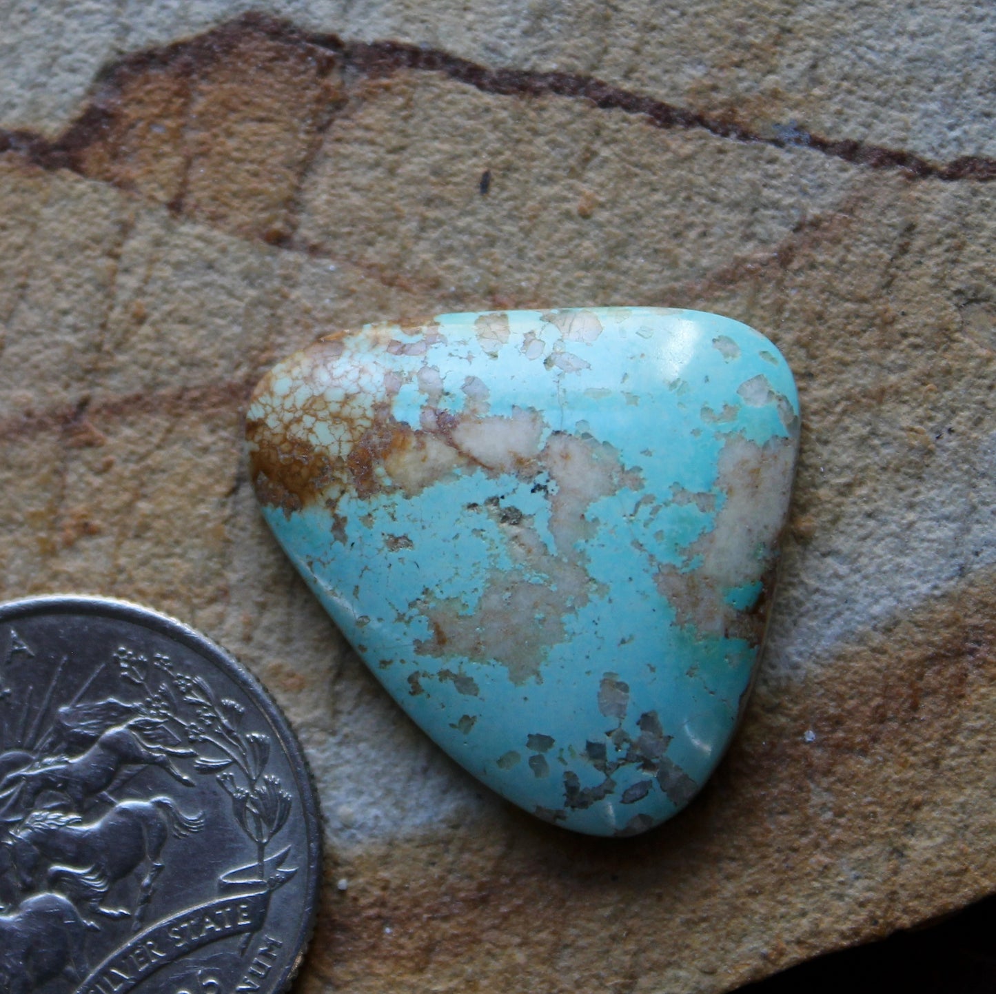 22 carat blue Stone Mountain Turquoise cabochon with a high dome
