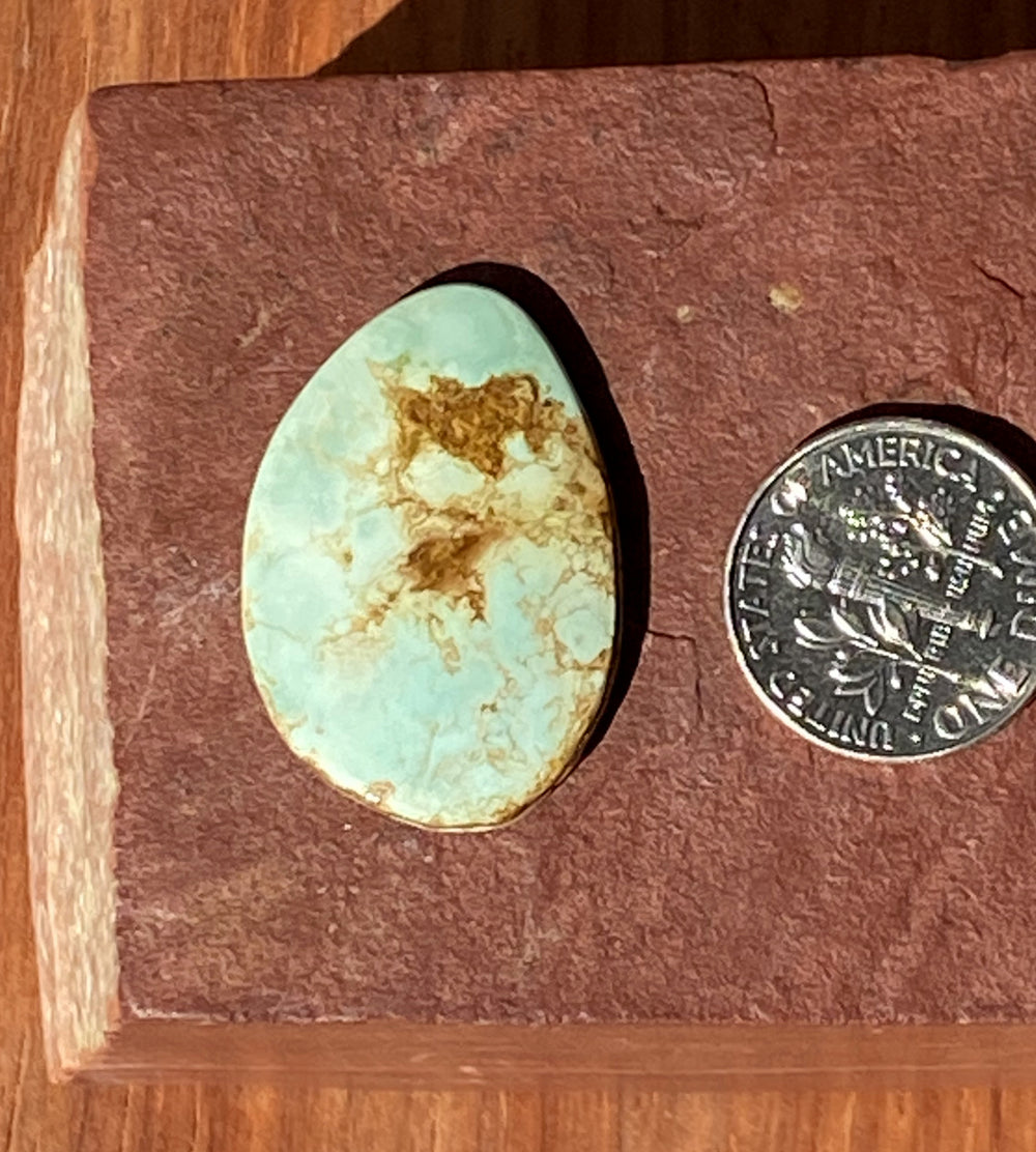 14 carats natural light blue boulder-cut Stone Mountain Turquoise cabochon with iron inclusions