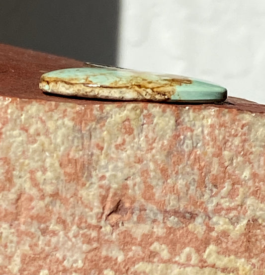 14 carats natural light blue boulder-cut Stone Mountain Turquoise cabochon with iron inclusions