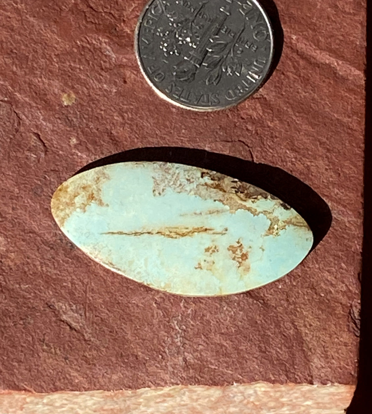 14 carat natural light blue Stone Mountain Turquoise cabochon with iron inclusions