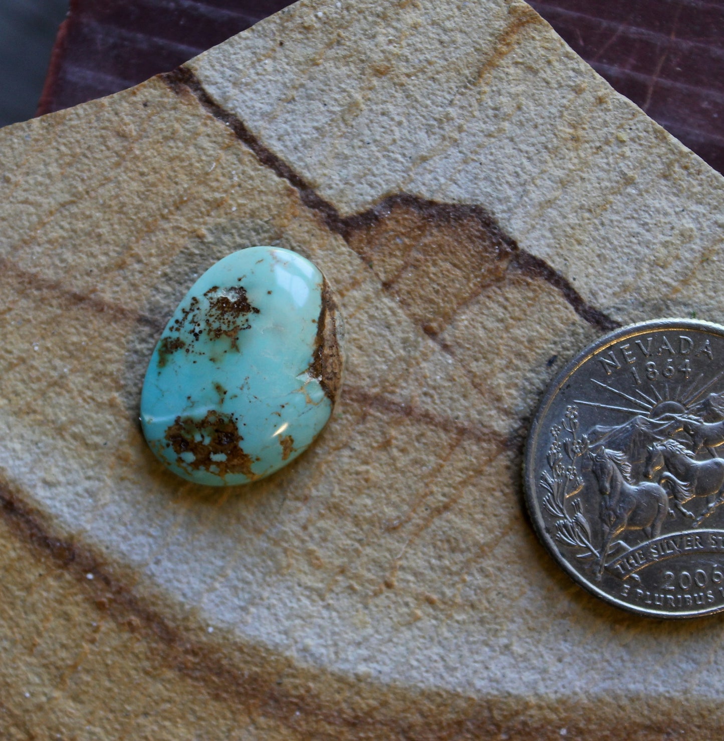 10 carat light blue Stone Mountain Turquoise cabochon with red matrix