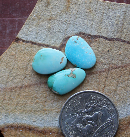 A trio of mixed blue Stone Mountain Turquoise cabochons