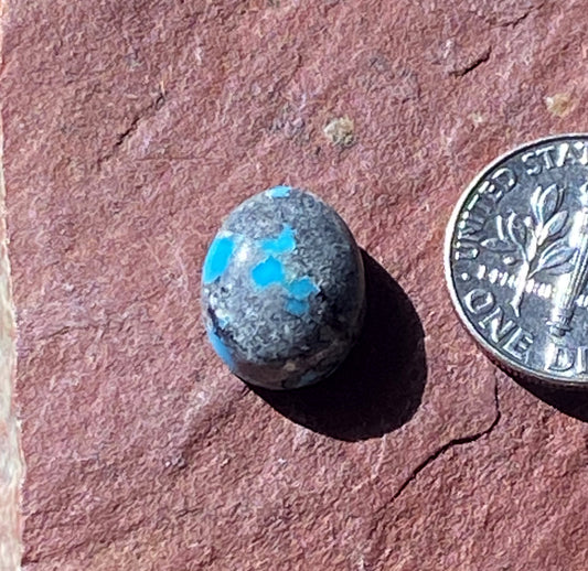 6 carat natural boulder-cut blue McGinnis Turquoise cabochon oval