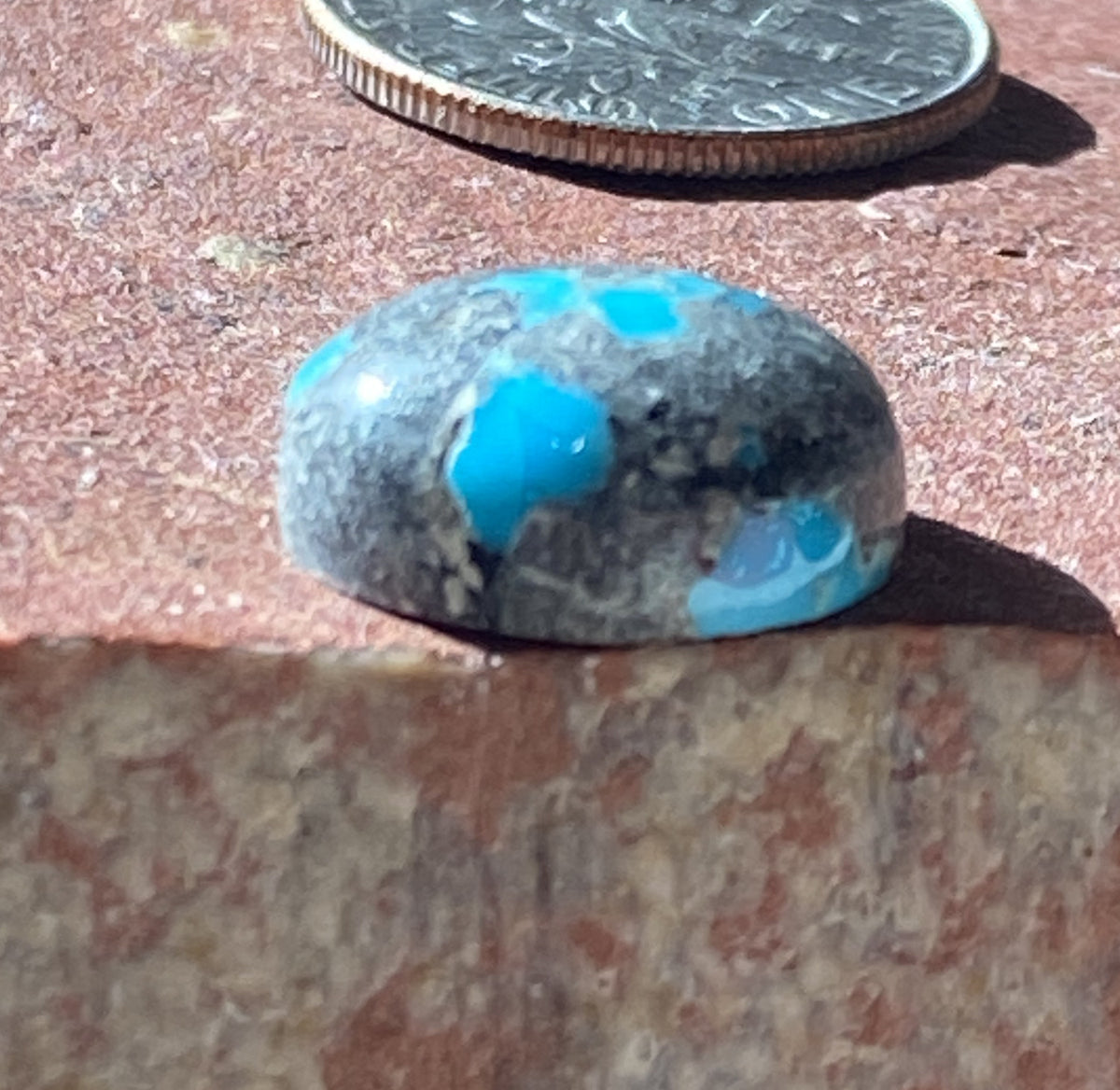 6 carat natural boulder-cut blue McGinnis Turquoise cabochon oval