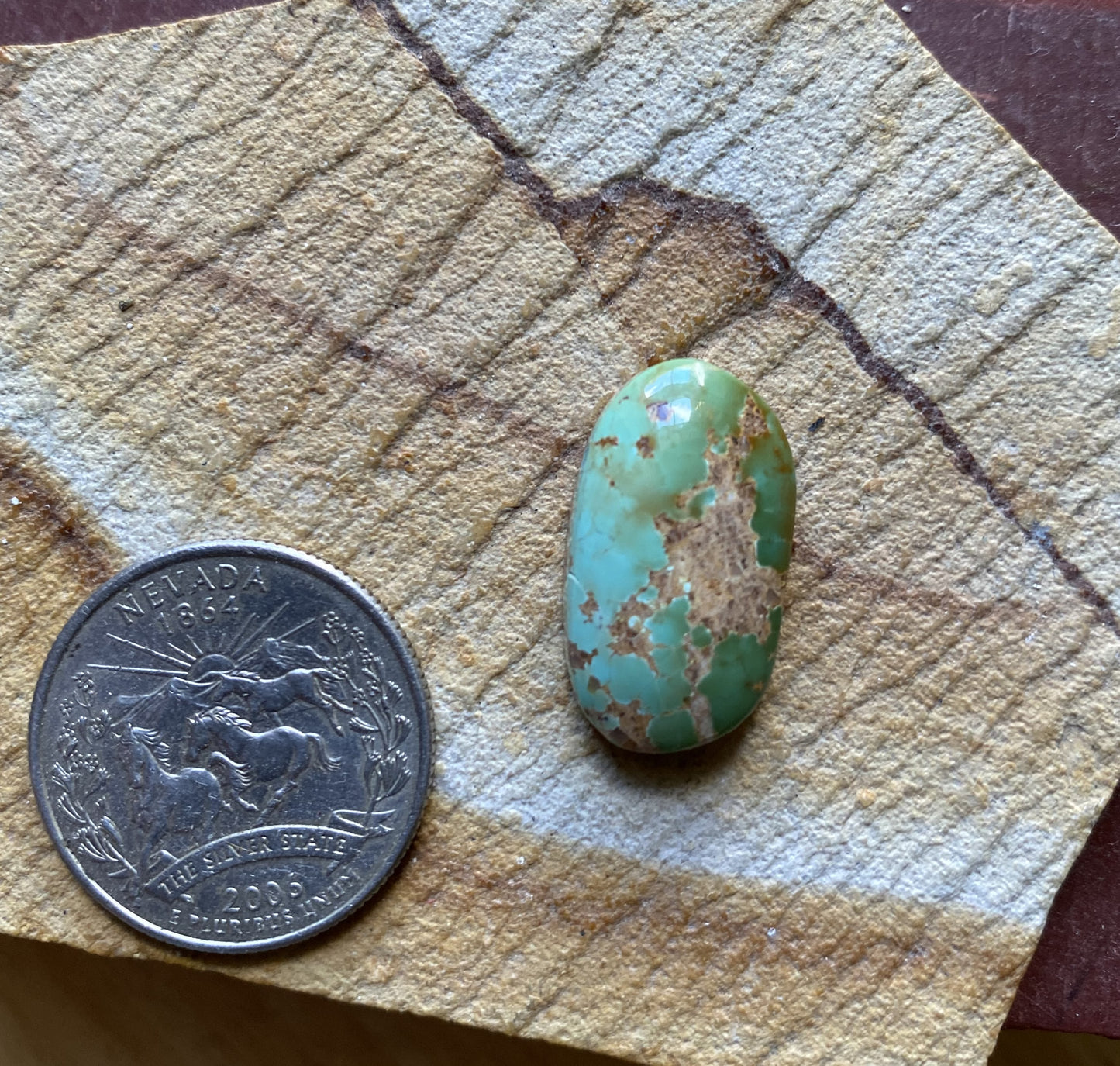 15 carat blue Stone Mountain turquoise cabochon with red matrix