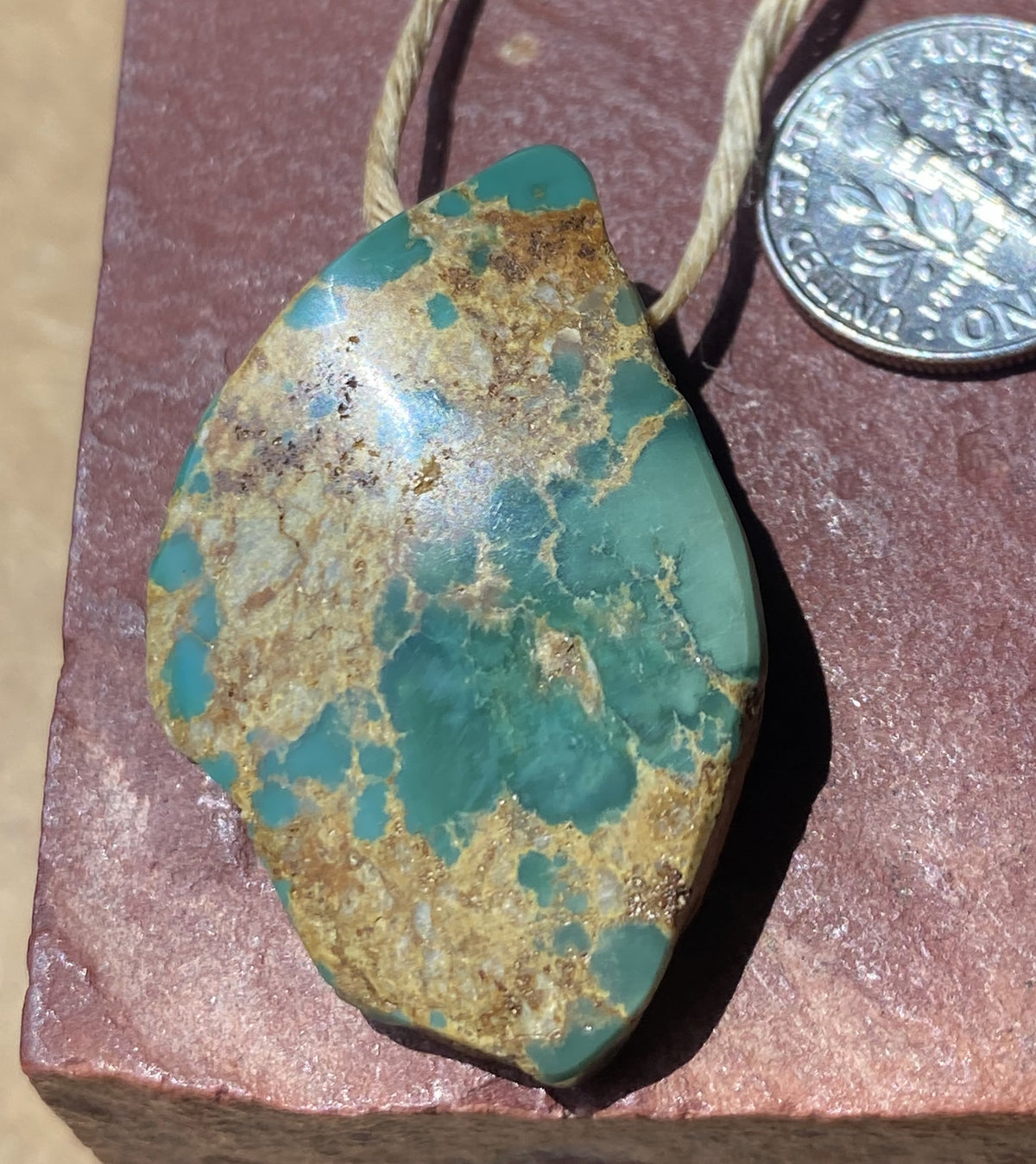 53.3 carat green turquoise focal bead from Stone Mountain Mine
