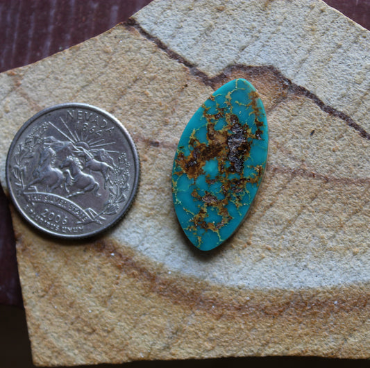 15 carat deep teal blue Stone Mountain Turquoise cabochon with red matrix