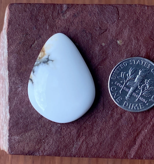 27 carat Tick Canyon howlite cabochon with black matrix