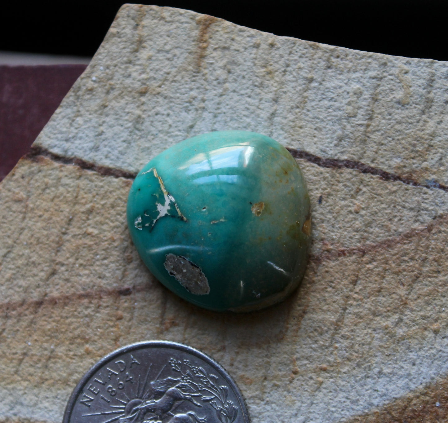 35 carat green Stone Mountain Turquoise cabochon with a high dome