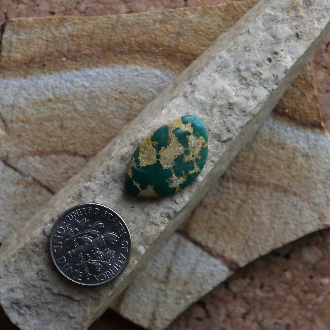 8.3 carat dark green Stone Mountain Turquoise cabochon