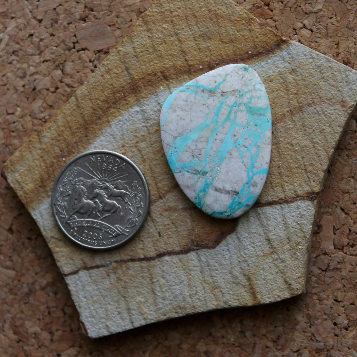 32 carat boulder cut Stone Mountain Turquoise cabochon with icy contrasts
