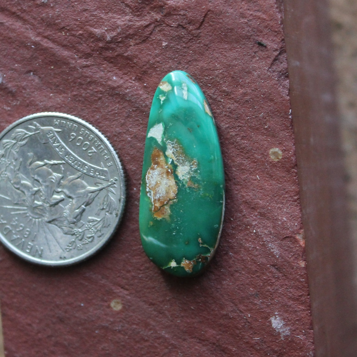 16 carat green Stone Mountain Turquoise cabochon with red matrix