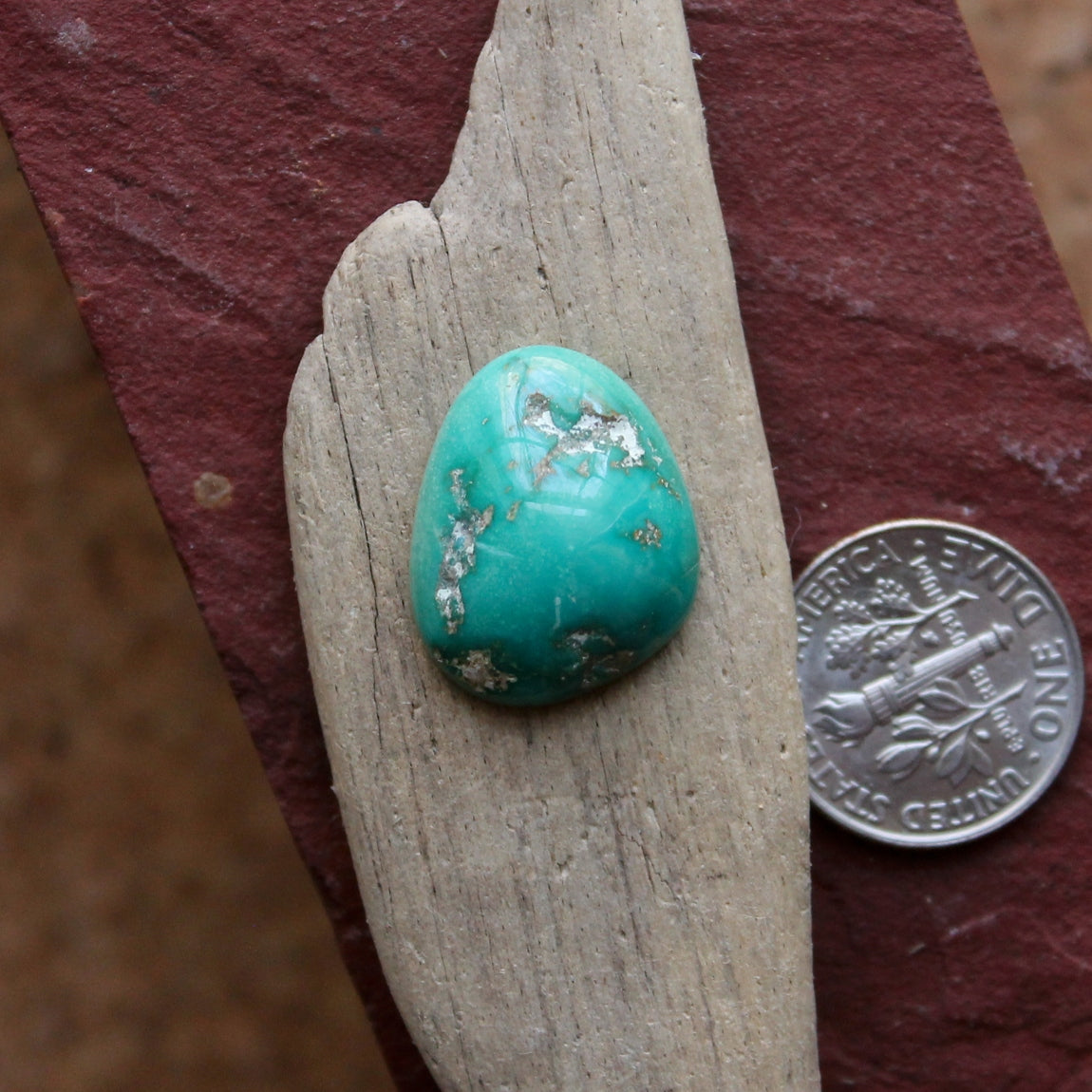 12 carat green Stone Mountain Turquoise cabochon with a high dome