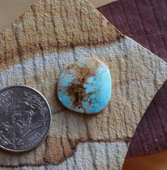 10 carat light blue Stone Mountain Turquoise cabochon with red matrix