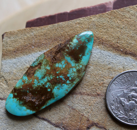 31 carat blue Stone Mountain Turquoise cabochon with red matrix