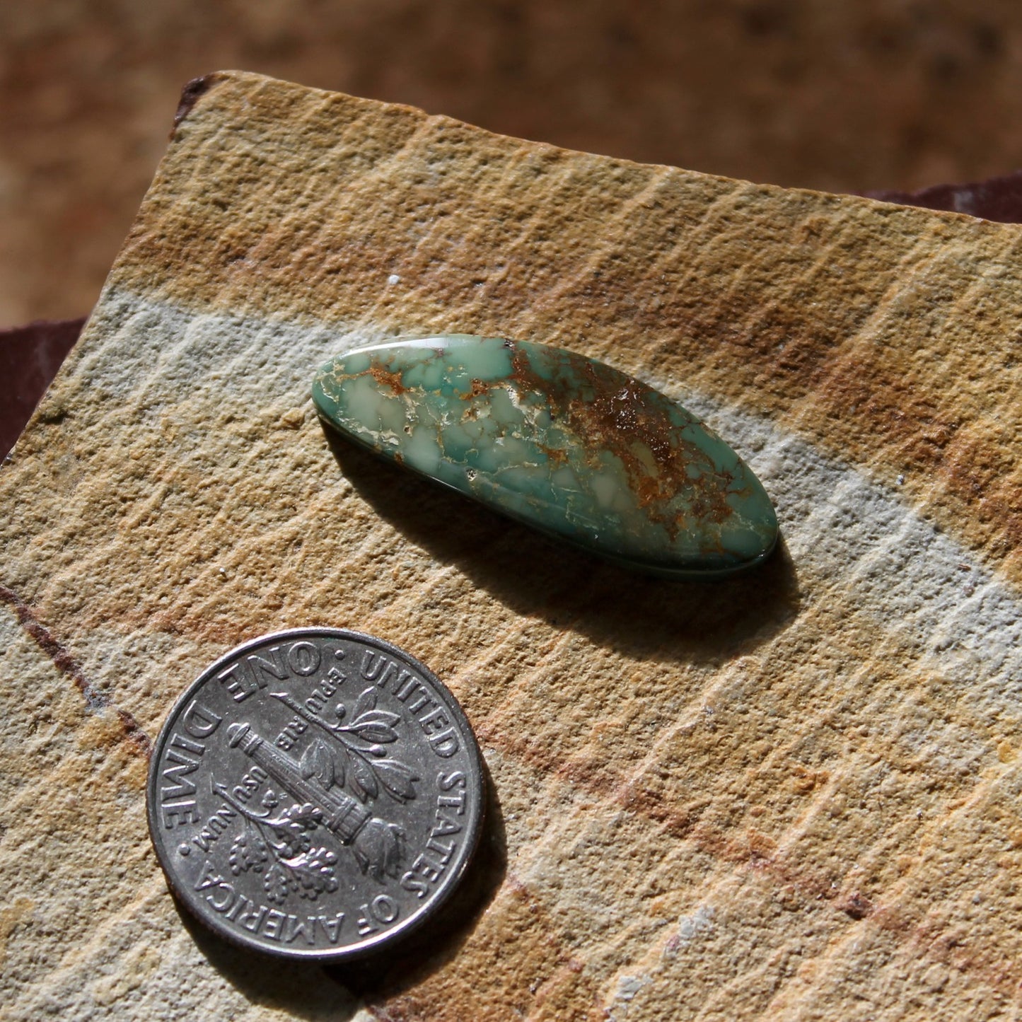 5.8 carat elongated green Stone Mountain Turquoise cabochon