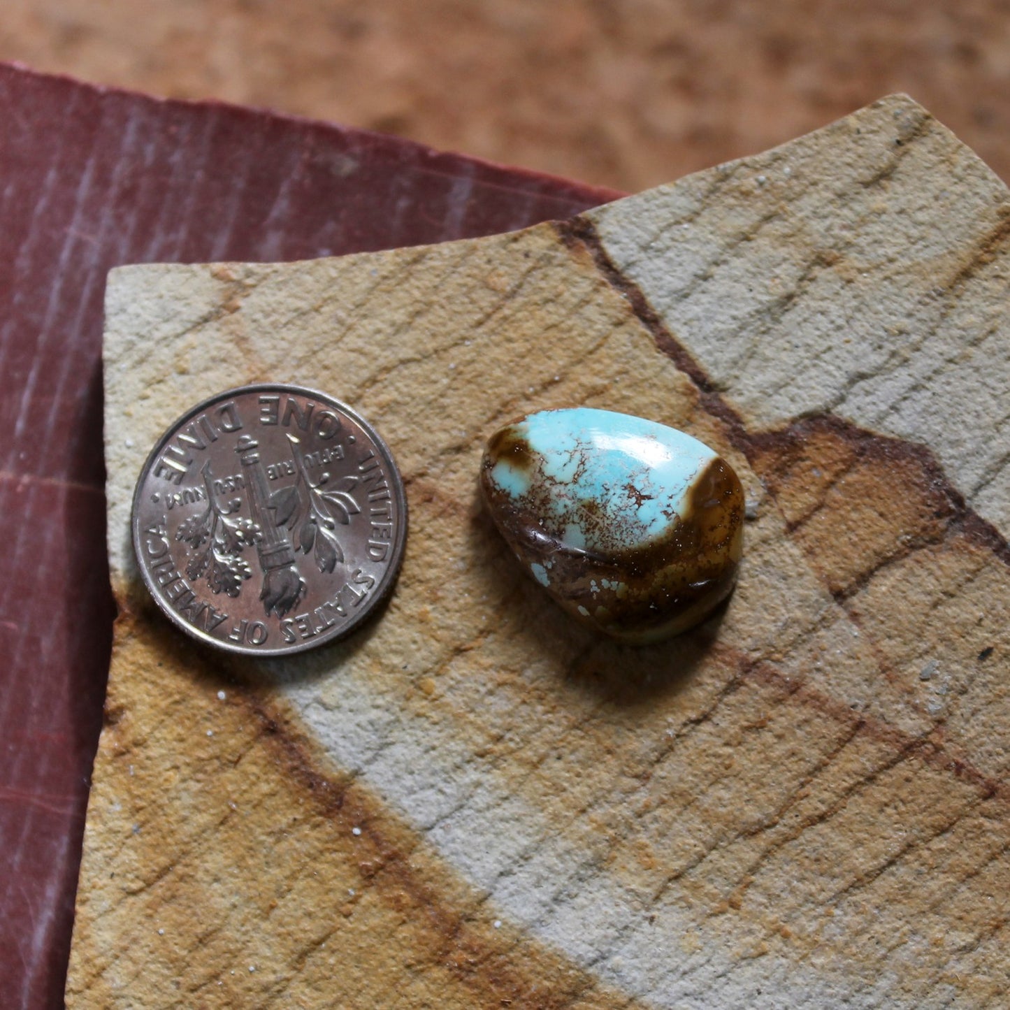 9.3 carat blue Stone Mountain Turquoise cabochon with red matrix