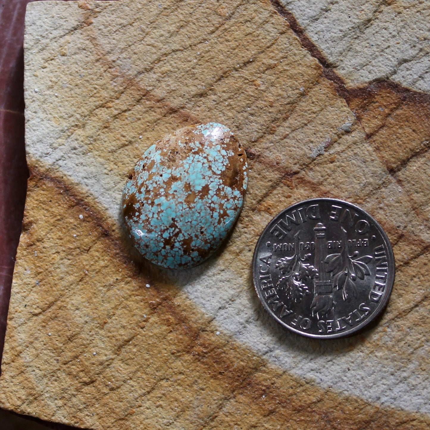 6.7 carat light blue Stone Mountain Turquoise cabochon with red matrix