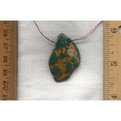 A rich green Stone Mountain Turquoise focal bead with bronze matrix.