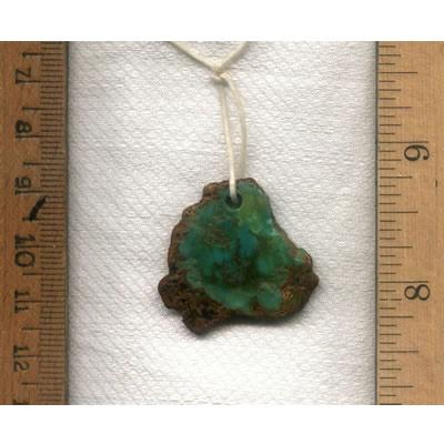 A deep green Stone Mountain Turquoise focal bead, by the Nevada Cassidys
