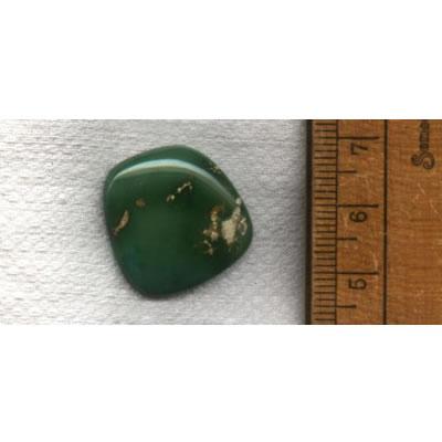 A deep green turquoise cabochon from Stone Mountain Mine designed by Nevada Cassidys