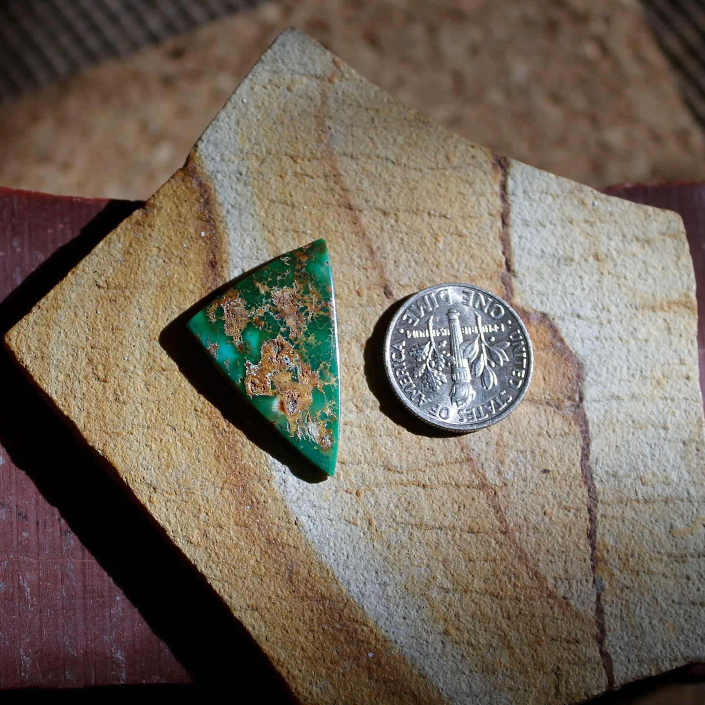8.8 carat trangular green Stone Mountain Turquoise cabochon with red matrix