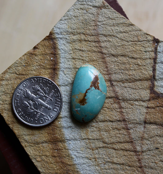 8 carat blue Stone Mountain Turquoise cabochon with red matrix