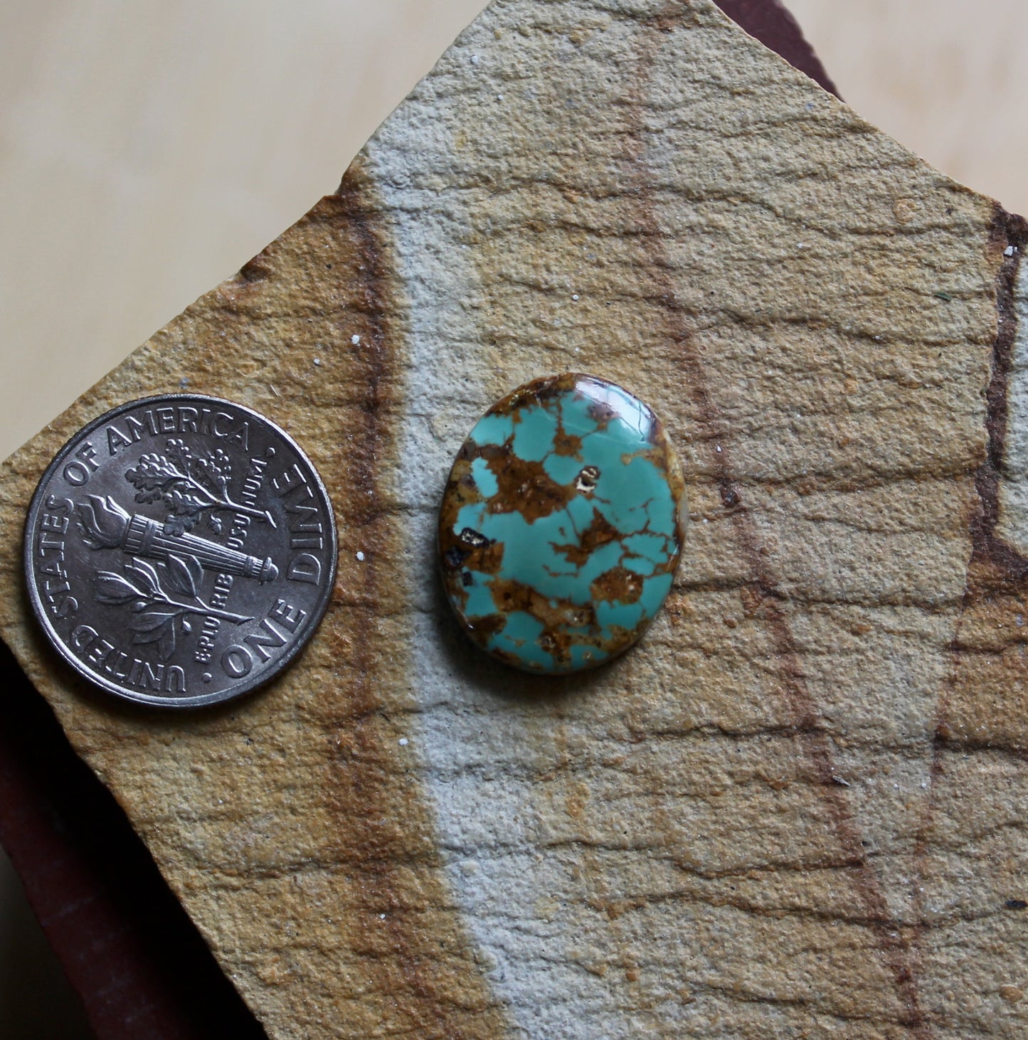 7 carat blue Stone Mountain Turquoise cabochon oval with red matrix