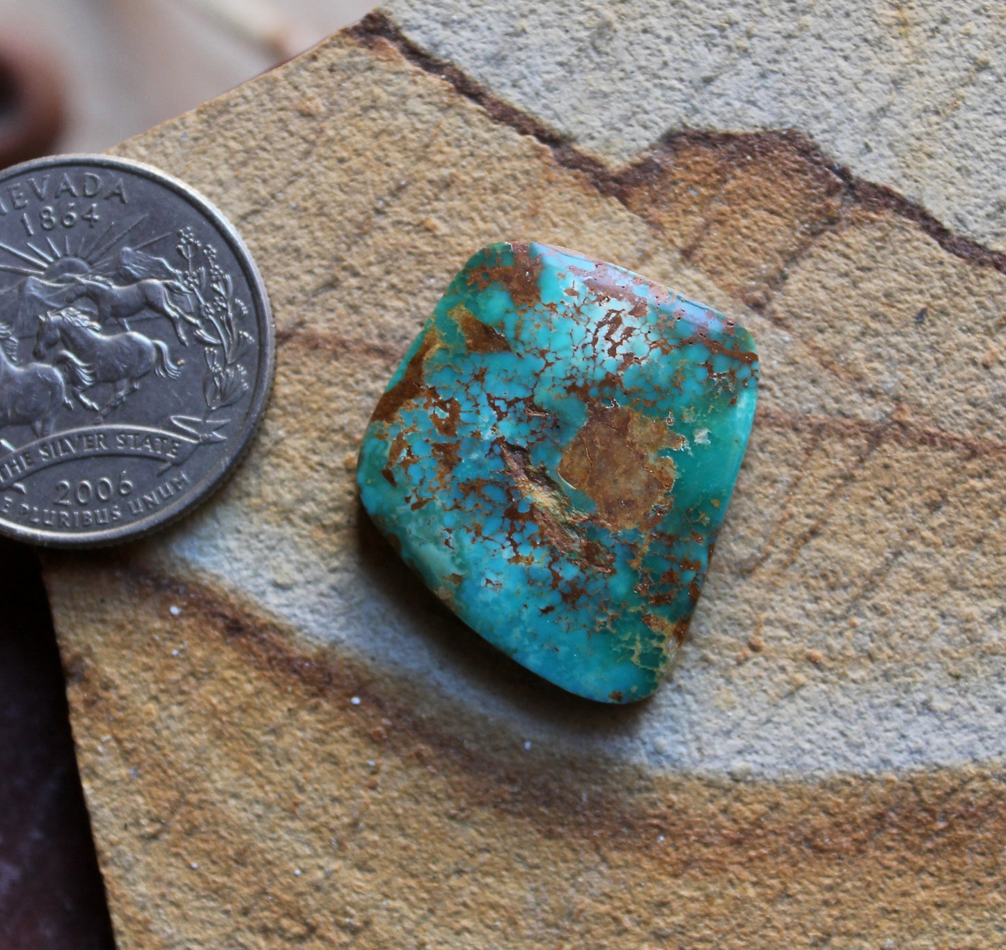 22 carat vivid blue Stone Mountain Turquoise cabochon with red matrix