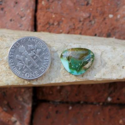 Dark green and color changes on this natural Nevada turquoise cabochon