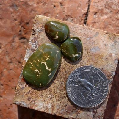 Dark green and tan contrast on these natural Nevada turquoise cabochons