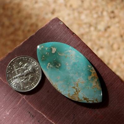 Sharp corners and color changes on this Stone Mountain Turquoise freeform cabochon