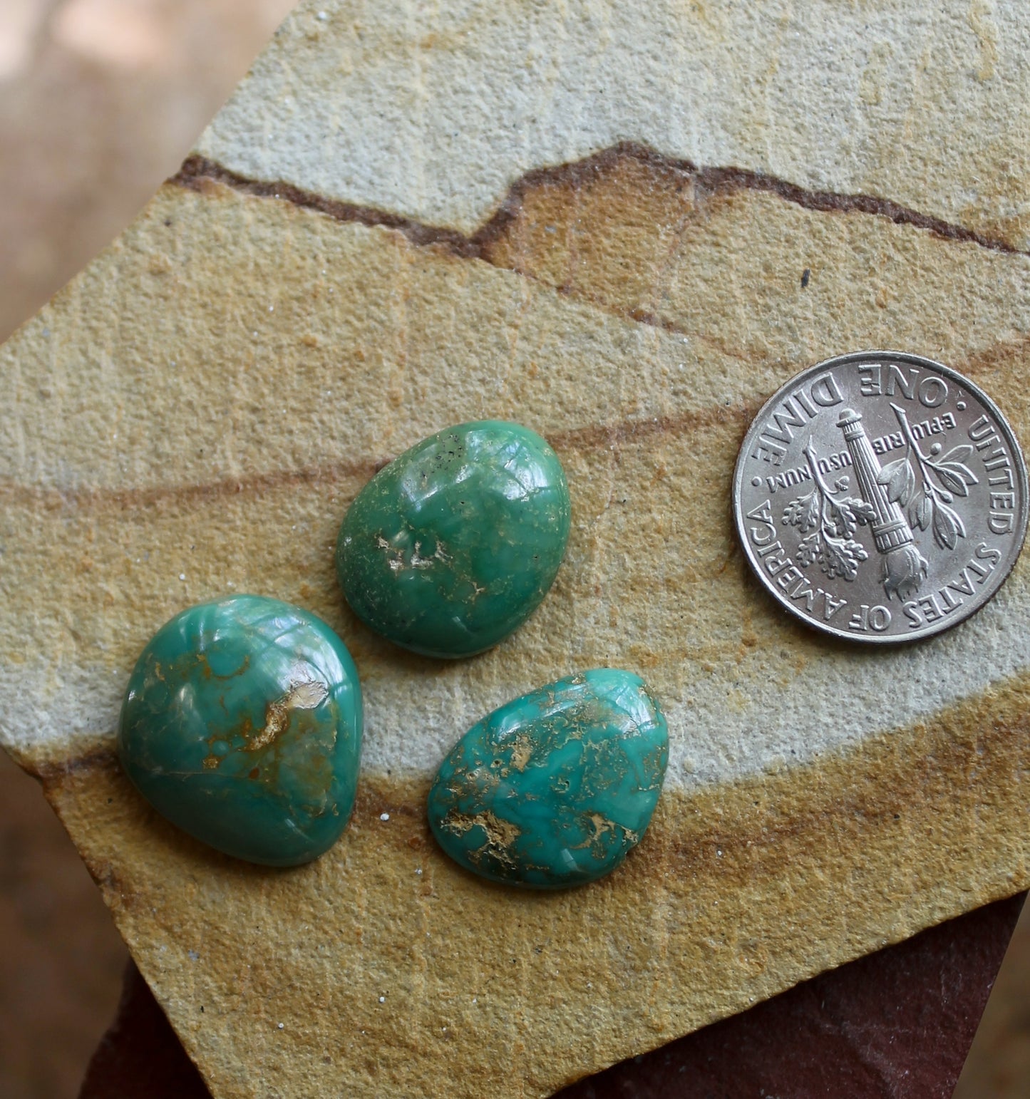 A trio of green turquoise cabochons from Stone Mountain Turquoise Mine