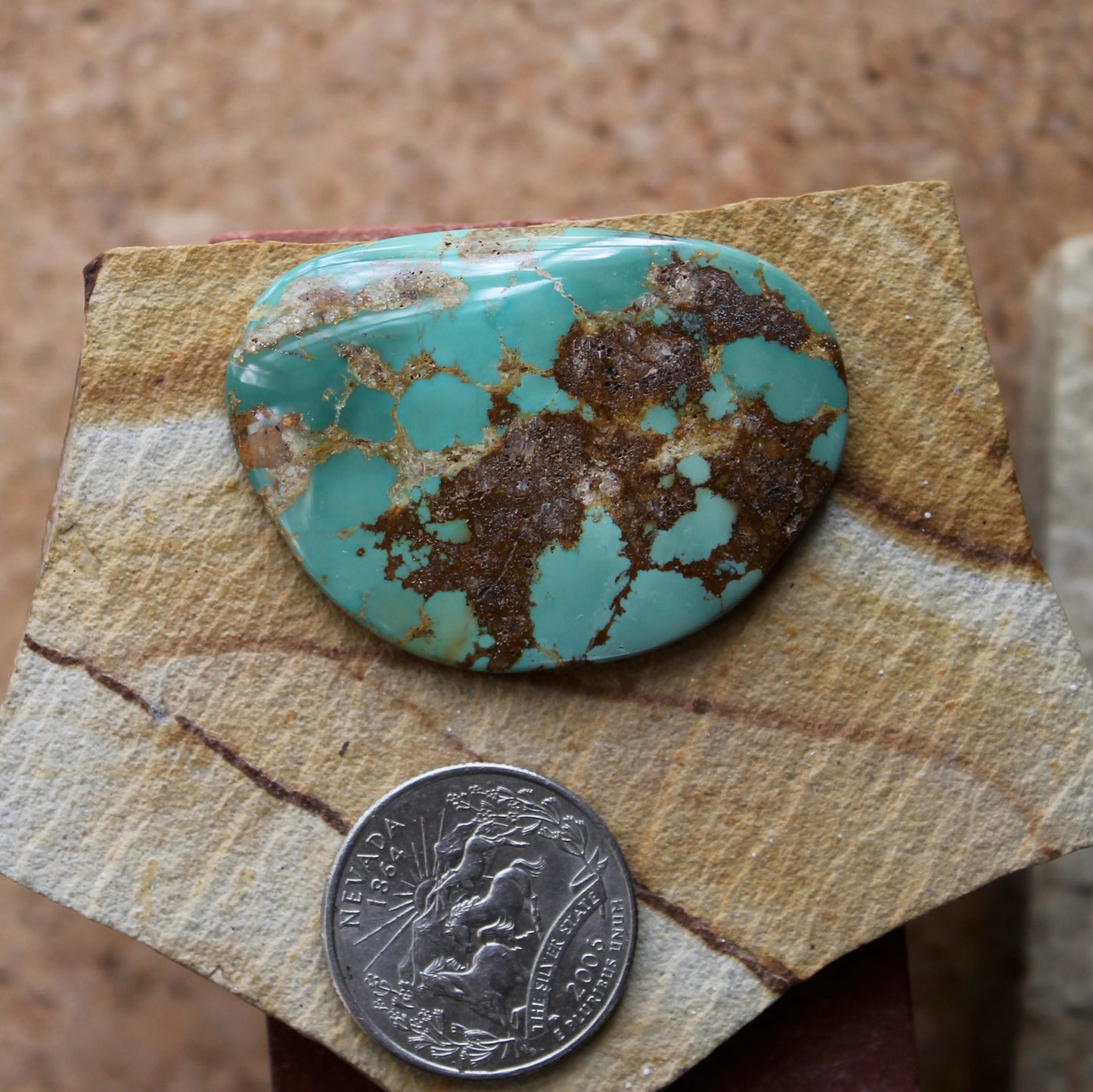 64 carat teal cabochon from Stone Mountain Mine
