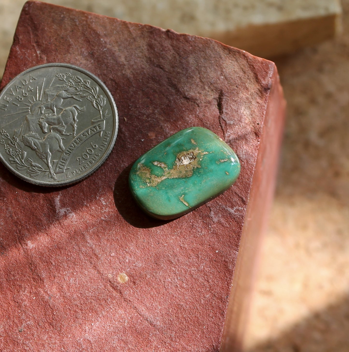 10 carat green Stone Mountain Turquoise cabochon with brown inclusions