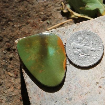 Dark green shades vary on this untreated & un-backed Stone Mountain Turquoise vein cabochon.